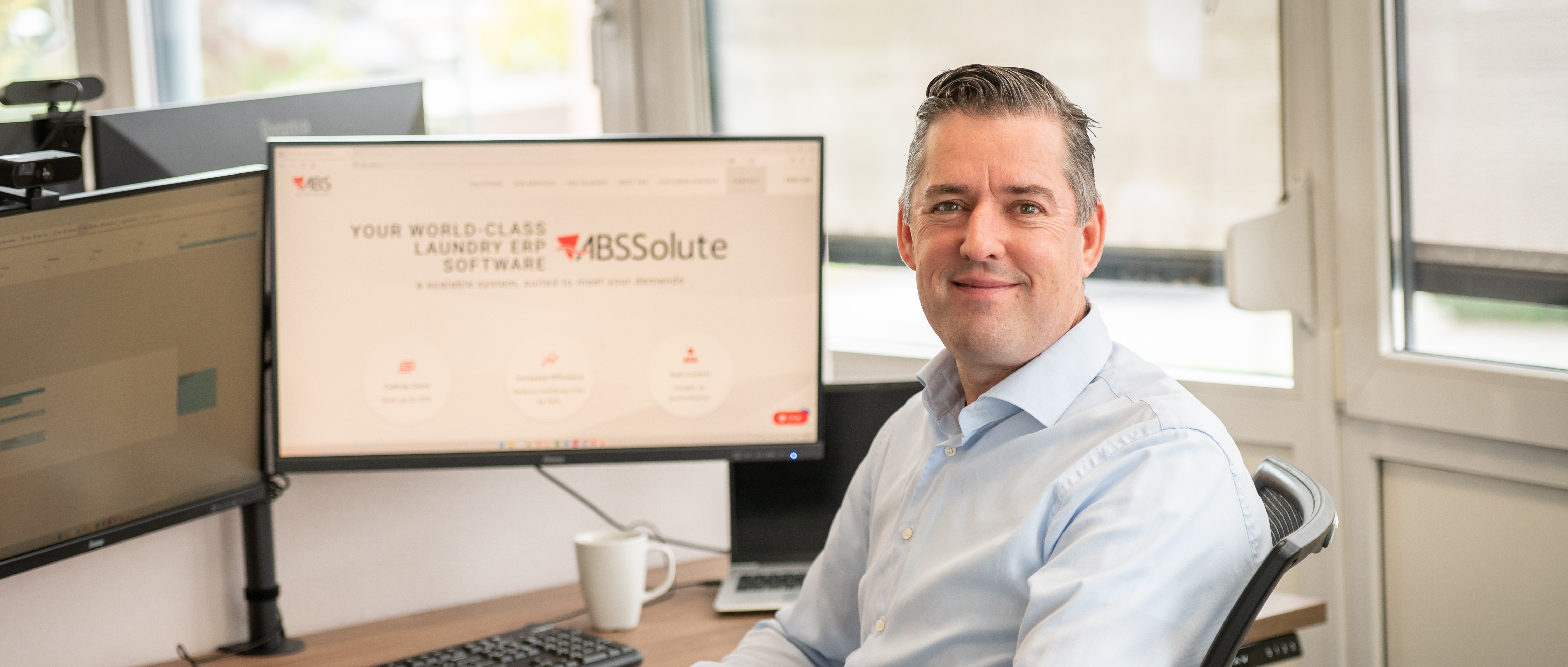 Portrait of Joris Minnaar, Solutions Architect at ABS Laundry Business Solutions, focused on cybersecurity and digital transformation in the industrial laundry sector